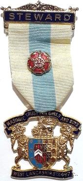 Знак MTGB 1997. STEWARD Masonic Trust for Girls and Boys.