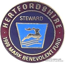 1999. Знак STEWARD Mark Benevolent Fund. 