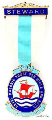 Знак MTGB 2012. STEWARD Masonic Trust for Girls and Boys.